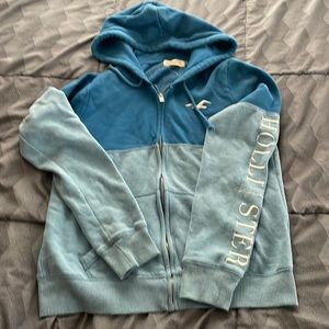 Lg Hollister sweatshirt. Color blue. Fits more like a small. Good shape.